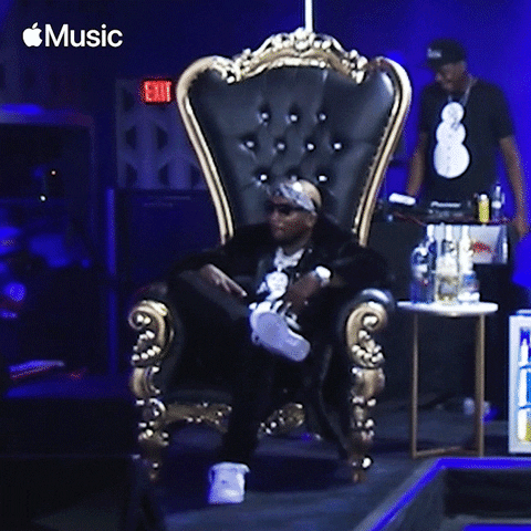 A gif of Tupac on a throne